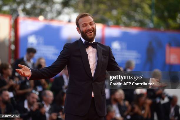 Italian actor Alessandro Borghi arrives for the opening ceremony of the 74th Venice Film Festival and the premiere of the movie "Downsizing", on...