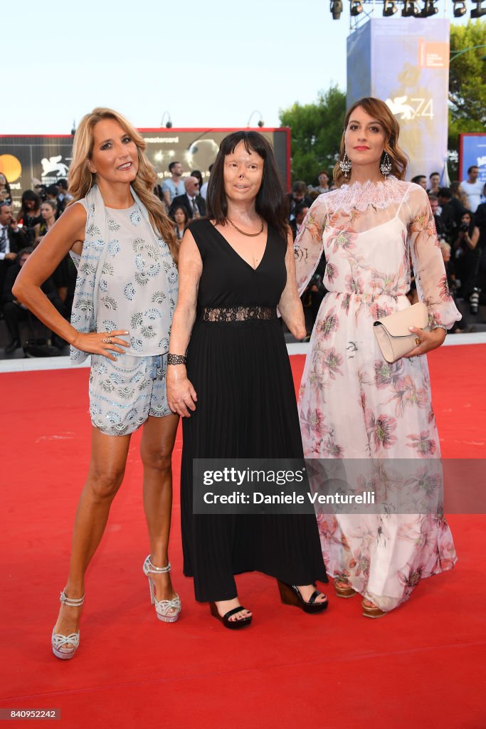 Jo Squillo, Valentina Pitzalis and Francesca Carollo walk the red