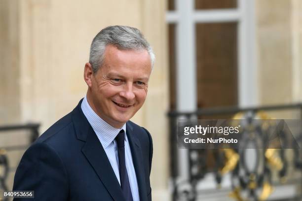 French Economy Minister Bruno Le Maire leaves the Elysee Palace in Paris on August 30 after a government meeting.