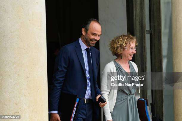 French Prime Minister Edouard Philippe and French Labour Minister Muriel Pénicaud leave the Elysee presidential palace after a cabinet meeting on...