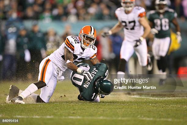 Wide receiver DeSean Jackson of the Philadelphia Eagles is tackled by defensive back Brandon McDonald of the Cleveland Browns during a game on...