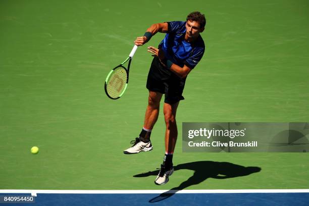 Henri Laaksonen of Switzerland serves to Juan Martin del Potro of Argentina during their first round Men's Singles match on Day Three of the 2017 US...