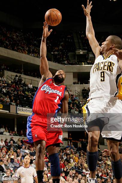 Baron Davis of the L.A. Clippers shoots over Maceo Baston of the Indiana Pacers at Conseco Fieldhouse on December 19, 2008 in Indianapolis, Indiana....