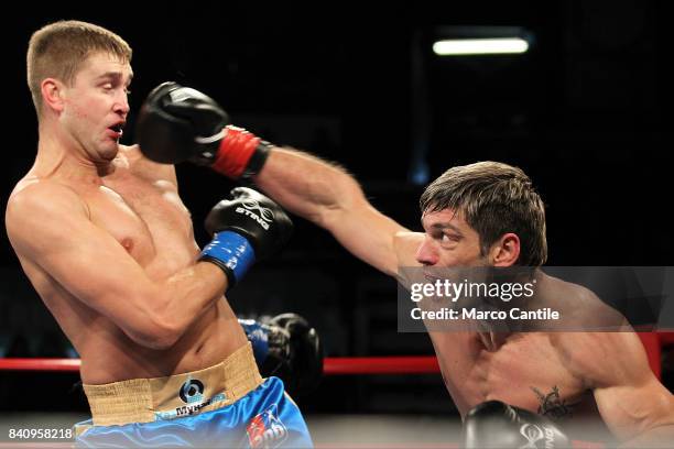 Italian boxer Clemente Russo fights against Anton Pinchuk in the qualifying match at Rio 2016. AIBA Pro Boxing - Road to Rio 2016.