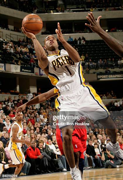 Jarrett Jack of the Indiana Pacers shoots over a Los Angeles Clippers defender at Conseco Fieldhouse on December 19, 2008 in Indianapolis, Indiana....