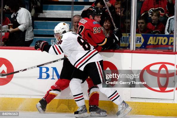 Robyn Ragehr Robyn Regehr of the Calgary Flames skates against Patrick Kane of the ...