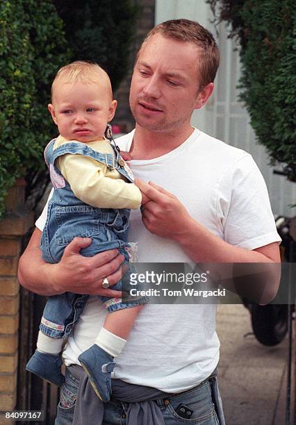 Jim Threapleton with his daughter Mia on September 5, 2001 in London, England.