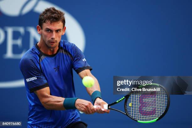 Henri Laaksonen of Switzerland returns a shot to Juan Martin del Potro of Argentina during their first round Men's Singles match on Day Three of the...