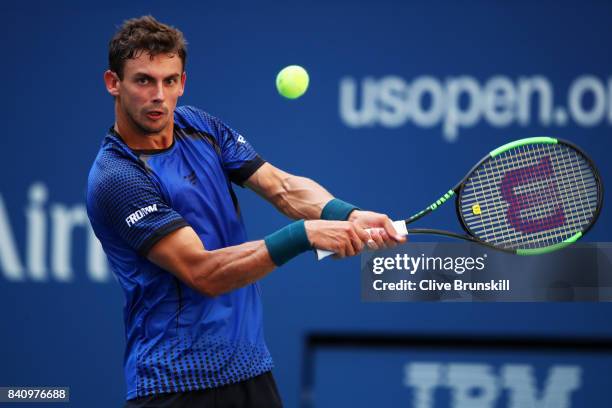Henri Laaksonen of Switzerland returns a shot to Juan Martin del Potro of Argentina during their first round Men's Singles match on Day Three of the...
