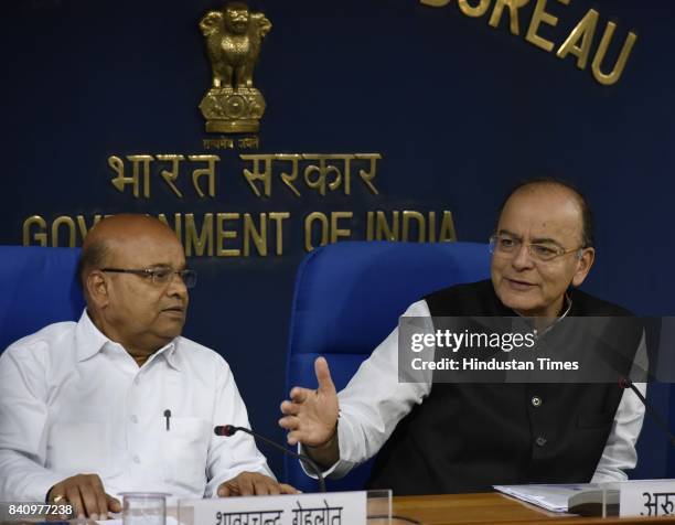 Union Finance Minister Arun Jaitley and Union Minister for Social Justice and Empowerment Thawar Chand Gehlot brief the media after cabinet meeting...