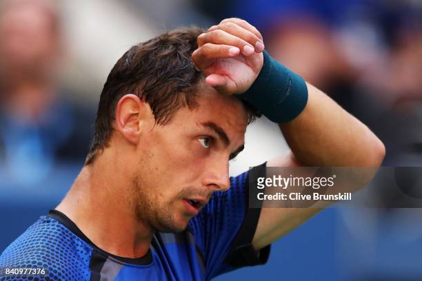 Henri Laaksonen of Switzerland reacts against Juan Martin del Potro of Argentina during their first round Men's Singles match on Day Three of the...