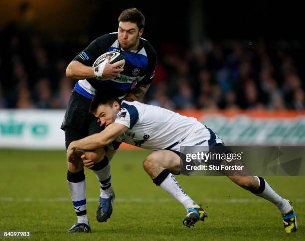 Sale Sharks winger Chris Bell tackles Matt Banahan of Bath during the Guinness Premiership match between Bath and Sale Sharks at The Recreation...