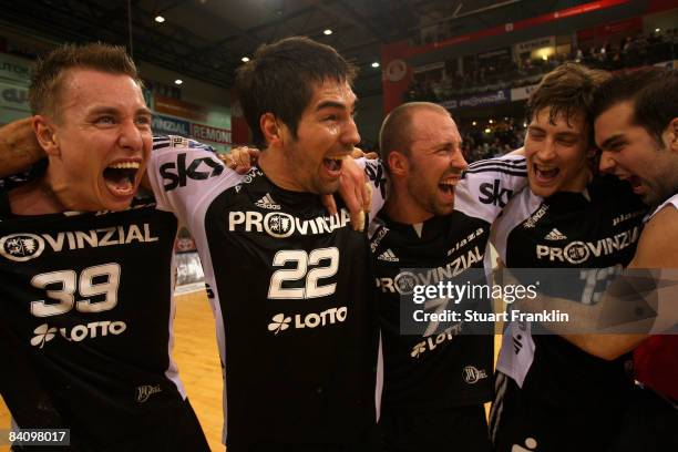 Filip Jicha, Nikola Karabatic, Vid Kavticnik and Marcus Ahlm of Kiel celebrate winning the game and being league leaders at the end of the Toyota...