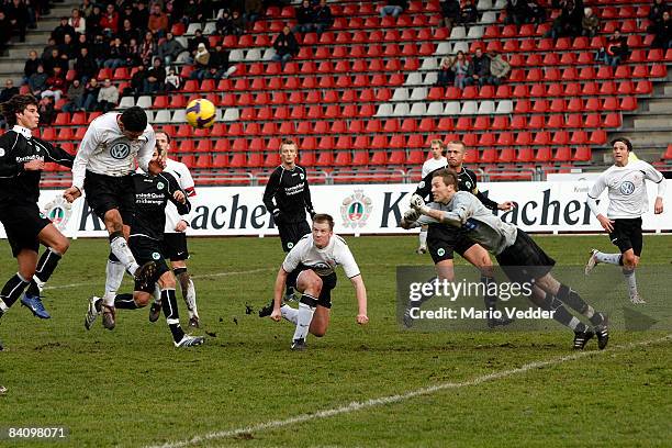 Mentor Latifi of Hessen Kassel jumps for the ball during the regional league match between KSV Hessen Kassel and SpVgg Greuther Fuerth at the Aue...