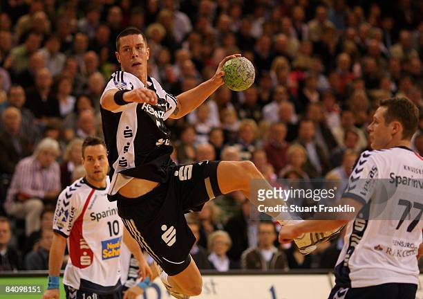 Kim Andersson of Kiel throws a goal during the Toyota Handball league game between SG Flensburg-Handewitt and THW Kiel at the Campus Hall on December...