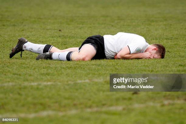 Thorsten Bauer of Kassel reacts after a foul play during the regional league match between KSV Hessen Kassel and SpVgg Greuther Fuerth at the Aue...