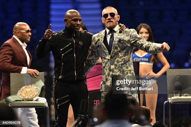 Floyd Mayweather Jr. And Conor McGregor attend a news conference after Mayweather defeated Conor McGregor by 10th-round TKO in their super...