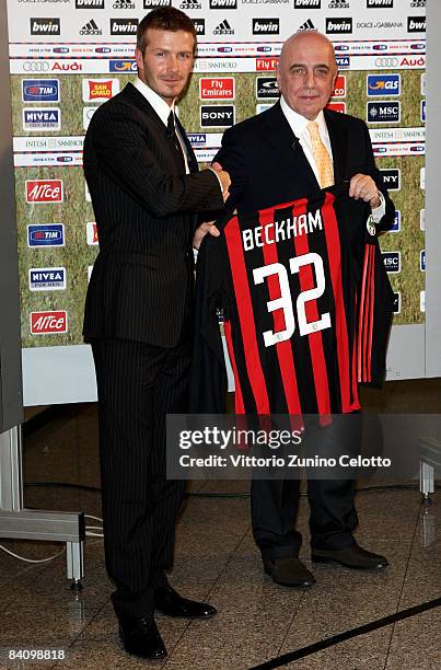 David Beckham and AC Milan General Manager Adriano Galliani after a press conference at the San Siro Stadium where he signed for AC Milan on a two...