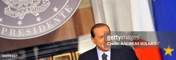 Italian Prime Minister Silvio Berlusconi speaks during a "end of the year" press conference on December 20, 2008 at Villa Madama in Rome. Berlusconi...