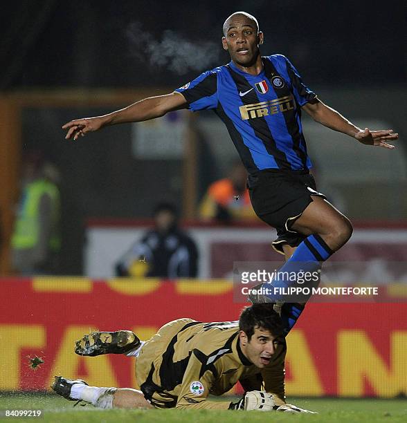 Inter Milan's Brazilian defender Maicon scores past Siena's goalkeeper Gianluca Curci during their Italian Serie A match on December 20, 2008 at...