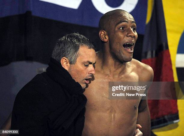 Maicon of FC Inter Milan celebrates with his manager Jose Mourinho after scoring during the Serie A match between AC Siena and FC Inter Milan at the...