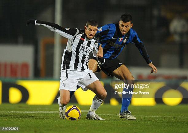 Mario Frick of AC Siena and Walter Samuel of FC Inter Milan in action during the Serie A match between AC Siena and FC Inter Milan at the Stadio...