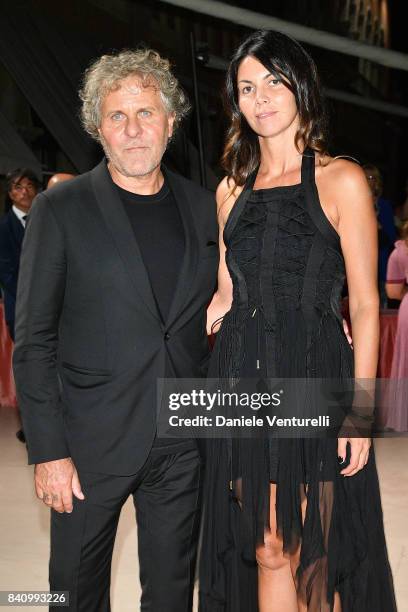 Renzo Rosso and Arianna Alessi arrive at the dinner after the Opening Ceremony during the 74th Venice Film Festival at Excelsior Hotel on August 30,...