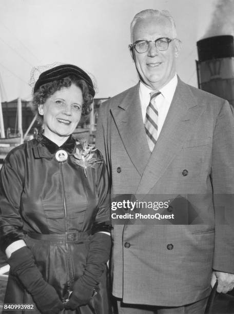 Portrait of Nina Warren and her husband, Chief Justice of the United States Supreme Court Earl Warren , as they pose on board the SS America, New...