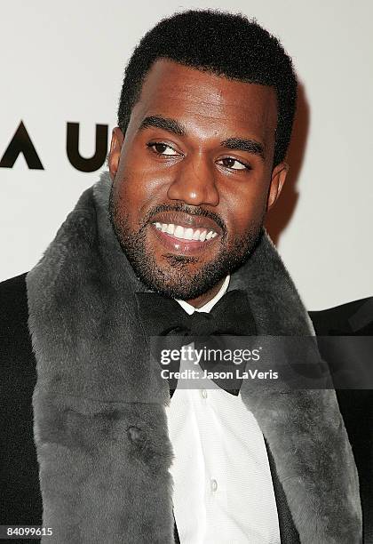 Rapper Kanye West attends Flaunt Magazine's 10th anniversary and annual holiday toy drive at The Wayne Kao Mansion on December 18, 2008 in Los...