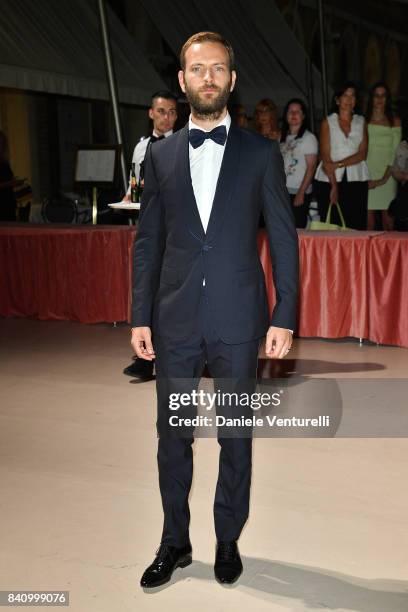 Festival host Alessandro Borghi arrives at the dinner after the Opening Ceremony during the 74th Venice Film Festival at Excelsior Hotel on August...