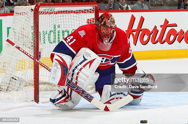 Jaroslav Halak of the Montreal Canadiens makes a save against the Buffalo Sabres during their NHL game at the Bell Centre December 20, 2008 in...