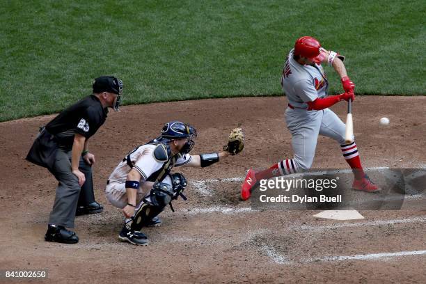 Randal Grichuk of the St. Louis Cardinals hits a home run in the fifth inning against the Milwaukee Brewers at Miller Park on August 30, 2017 in...