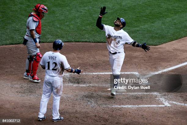 Jonathan Villar of the Milwaukee Brewers celebrates after hitting a home run in the sixth inning against the St. Louis Cardinals at Miller Park on...