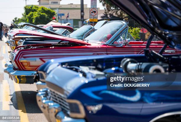 low rider vehicles at car show san diego california - low rider stock pictures, royalty-free photos & images