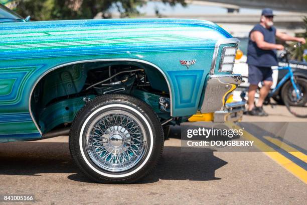 low rider vehicles at car show san diego california - low rider stock pictures, royalty-free photos & images