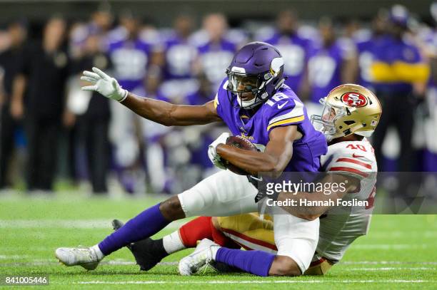 Vinnie Sunseri of the San Francisco 49ers tackles Michael Floyd of the Minnesota Vikings in the preseason game on August 27, 2017 at U.S. Bank...