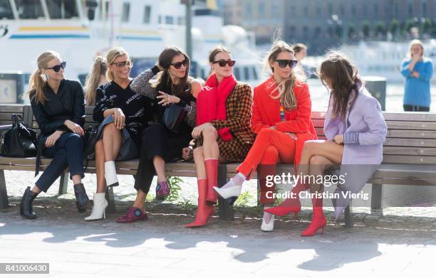 Guests sitting on a bench outside Whyred on August 30, 2017 in Stockholm, Sweden.