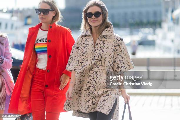 Line Langmo and Gine Margrethe wearing a jacket outside Whyred on August 30, 2017 in Stockholm, Sweden.
