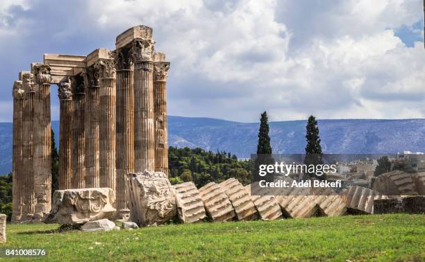 elevated view of the 'temple of olympian zeus' colossal ruined temple in central athens - temple of zeus stock pictures, royalty-free photos & images