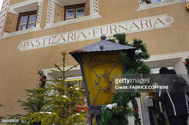 An inscription reading in Romansh "Cake shop-Backery" is seen in the tiny village of Zuoz in the Canton of Graubuenden, on December 18, 2008....