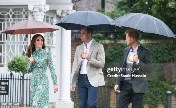 Prince William, Duke of Cambridge, Catherine, Duchess of Cambridge and Prince Harry visit The Sunken Garden at Kensington Palace on August 30, 2017...