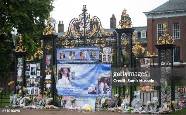 General view of flowers, photos and other souvenirs left as a tribute to Princess Diana near The Sunken Garden at Kensington Palace on August 30,...