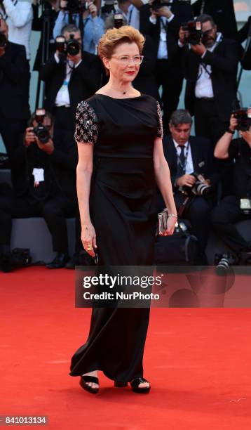 Annette Bening walks the red carpet ahead of the 'Downsizing' screening and Opening Ceremony during the 74th Venice Film Festival at Sala Grande on...