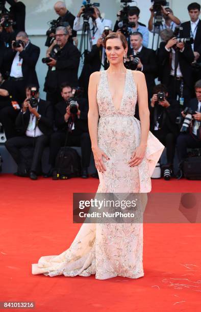 Kristen Wiig walks the red carpet ahead of the 'Downsizing' screening and Opening Ceremony during the 74th Venice Film Festival at Sala Grande on...