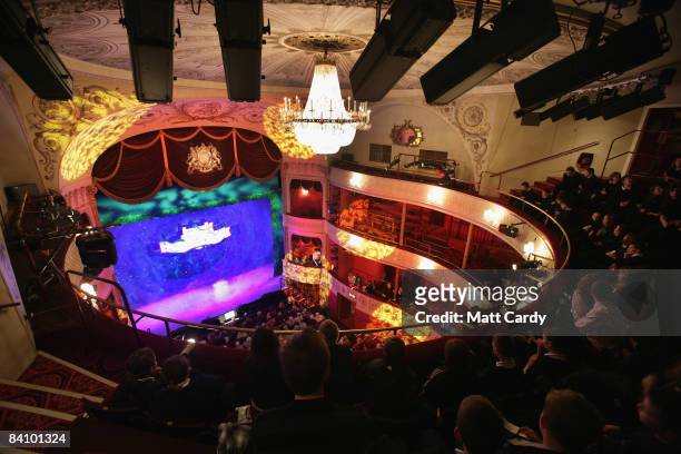 The audience watches as the production of the traditional pantomime Jack and the Beanstalk is shown on stage at the Theatre Royal Bath on December 20...
