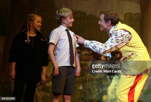 Members of the audience are brought onto the stage with Jon Monie who plays Simple Simon during the traditional pantomime Jack and the Beanstalk at...