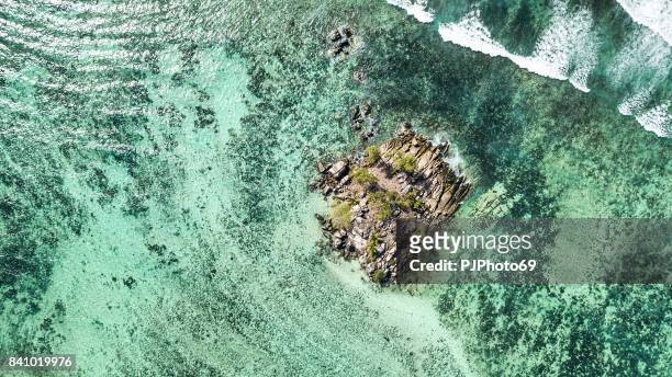 aerial view of souris island -  anse royale - mahe island - seychelles - pjphoto69 stock pictures, royalty-free photos & images