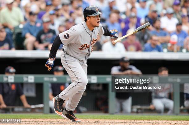 Miguel Cabrera of the Detroit Tigers has an RBI as he grounds into a double play with the bases loaded in the eighth inning of a game at Coors Field...