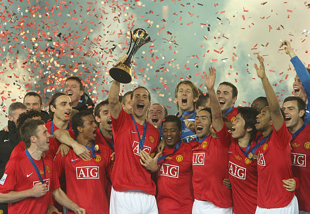 The Manchester United squad pose with the FIFA World Club Cup after the FIFA World Club Cup Final match between LDU Quito and Manchester United at...
