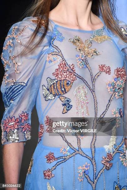 Model walks the runway during Fabiana Milazzo fashion show as part of Sao Paulo N44 Fashion Week Spring/Summer 2018 on August 28, 2017 in Sao Paulo,...